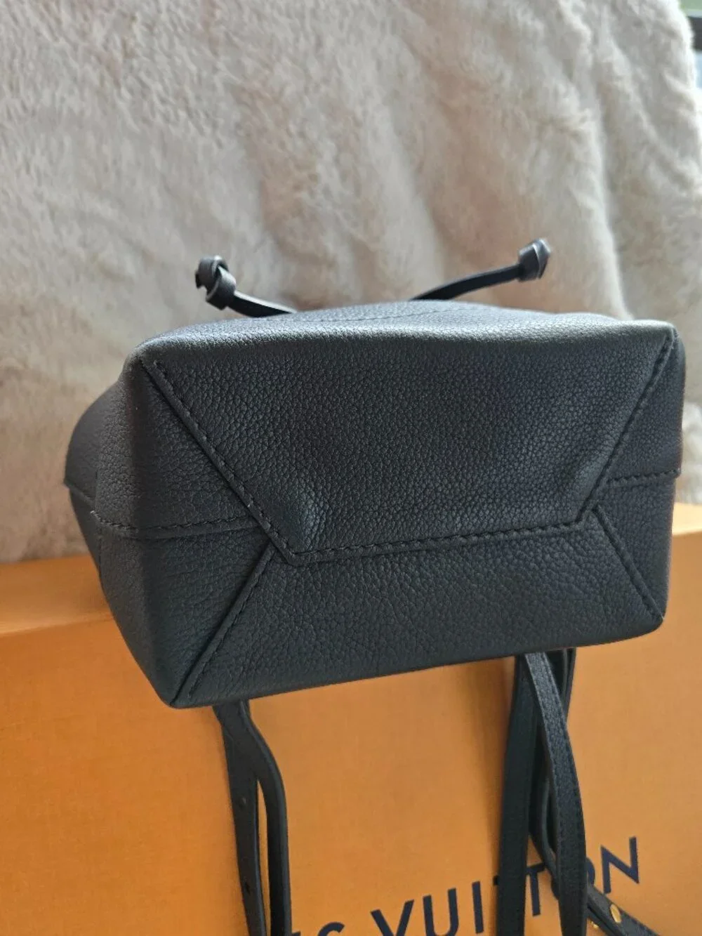 Louis Vuitton Lock Me Mini Backpack